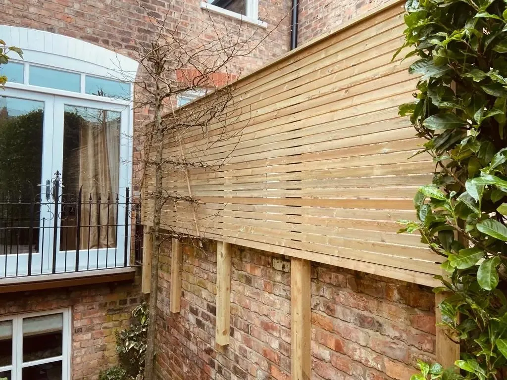 Venetian fencing installation by Tatton Fencing