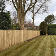 Continuous Featherboard fencing installation by Tatton Fencing