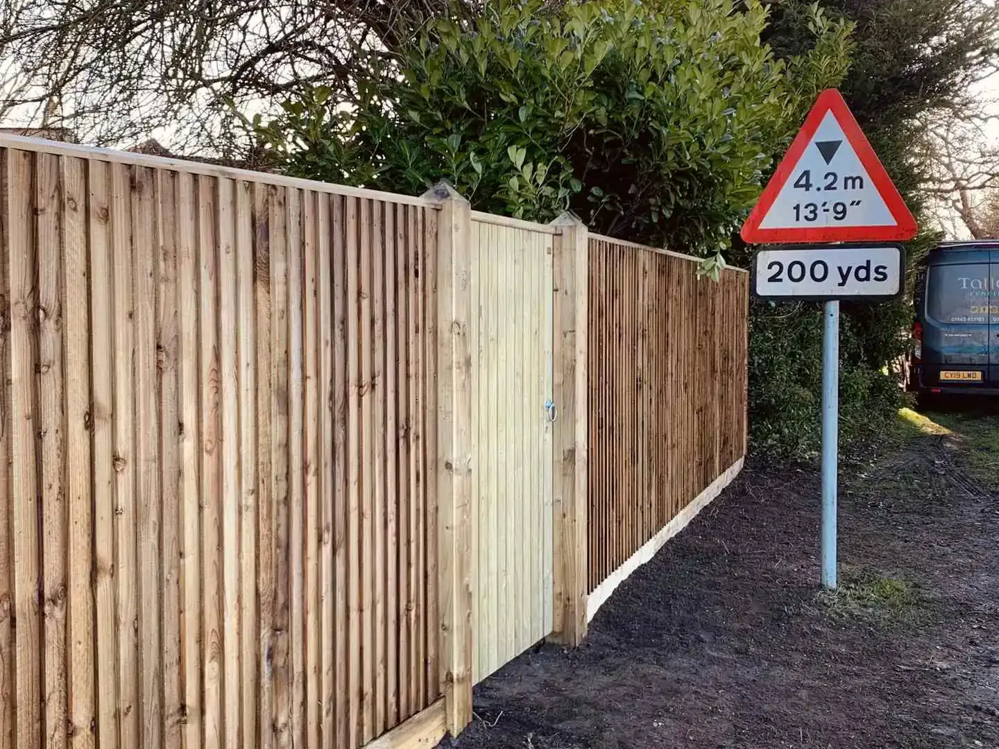 Continuous Featherboard fencing installation by Tatton Fencing