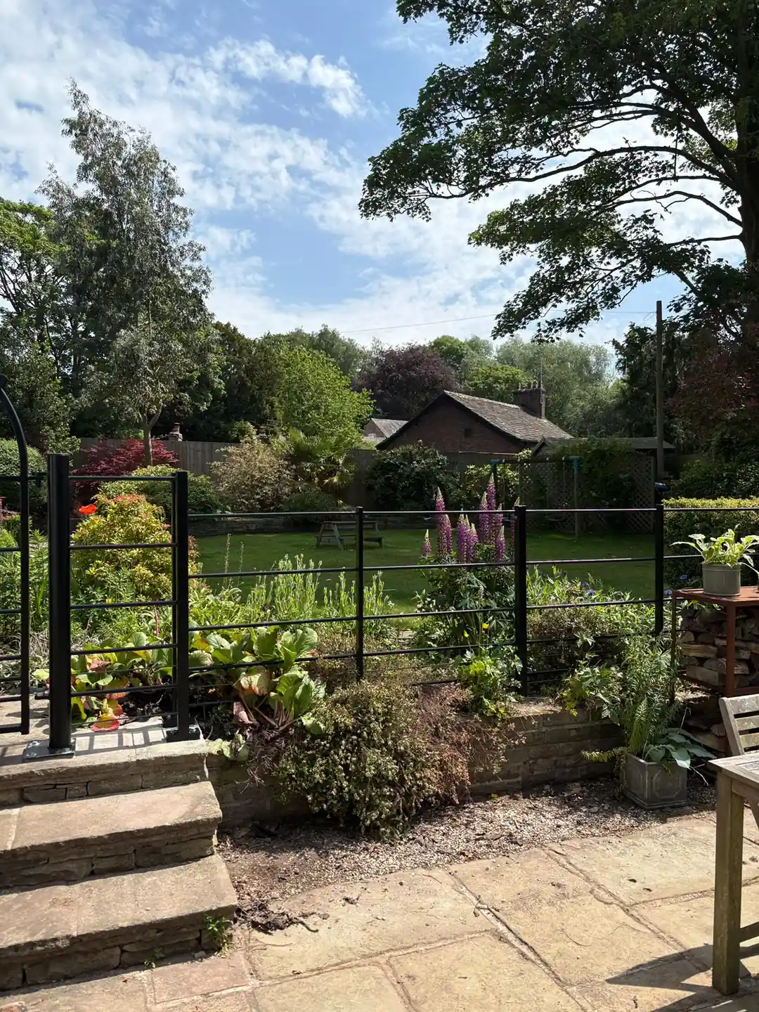 Modern estate railing panels installed by Tatton Fencing