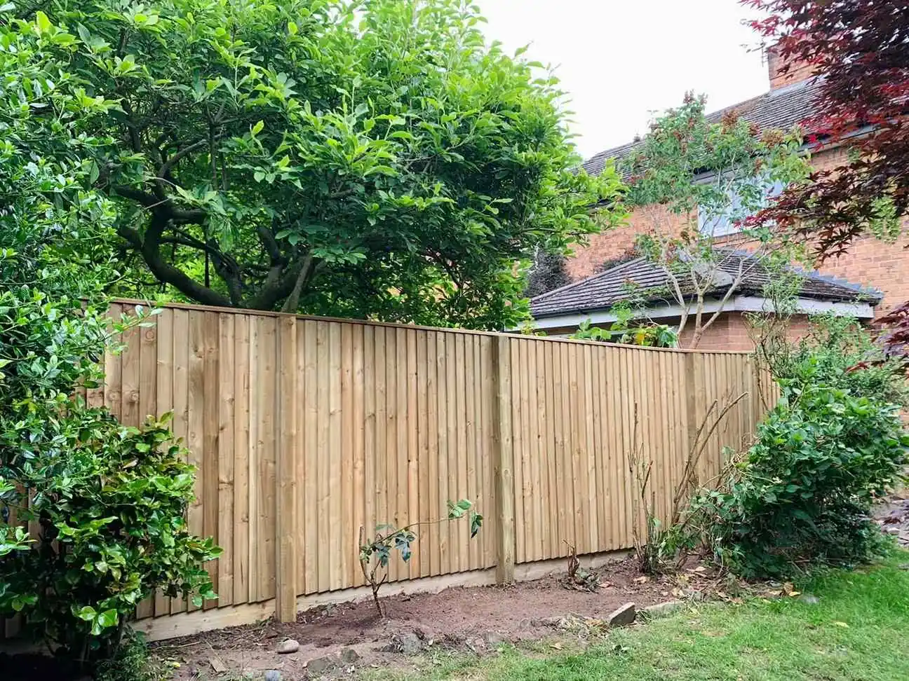Continuous Featherboard fencing installation by Tatton Fencing