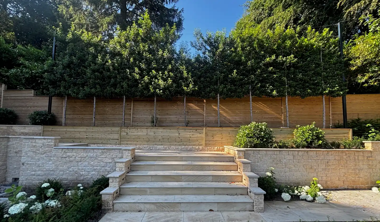Slatted Venetian fence panels installed by Tatton Fencing